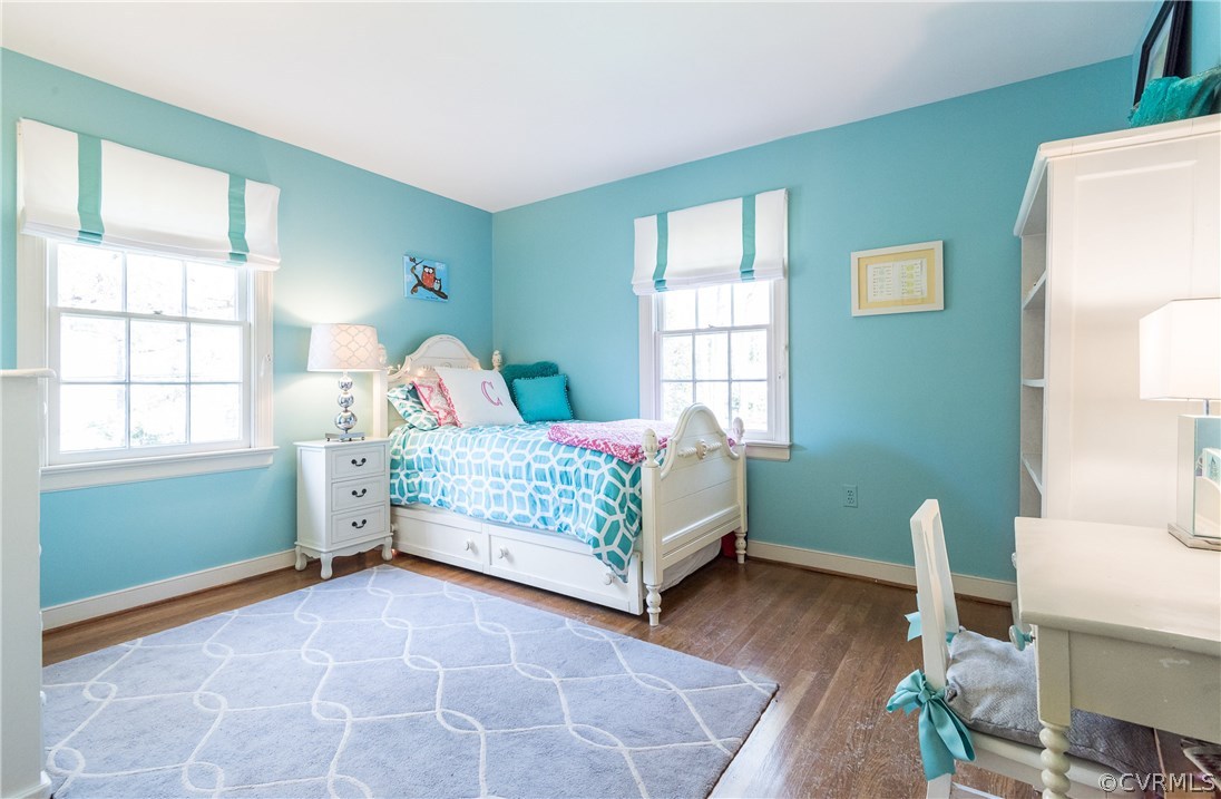 108 Ralston Road Henrico, VA 23229 - Photo 31 of 42 a bedroom with a bed wooden floor and window