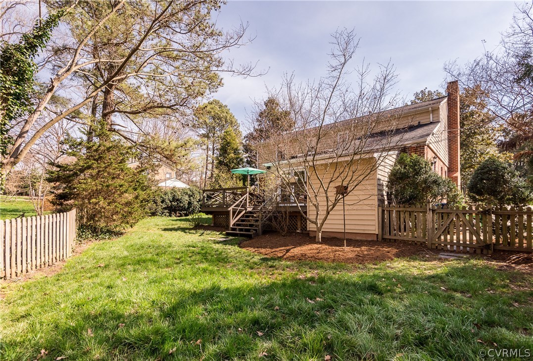 108 Ralston Road Henrico, VA 23229 - Photo 38 of 42 a view of a yard with wooden fence