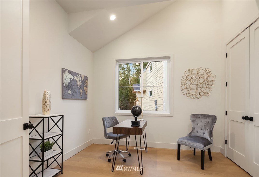 23528 7th Avenue Southeast Bothell, WA 98021 - Photo 14 of 30 a living room with furniture and a window