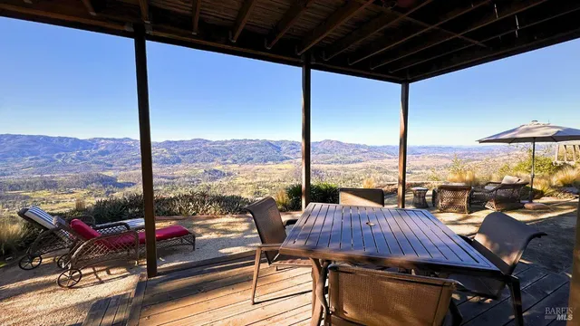 a view of sitting space next to a patio