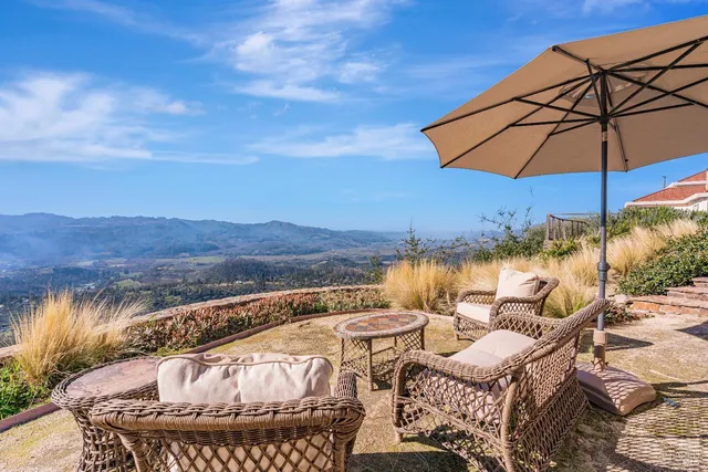 a view of swimming pool with outdoor seating