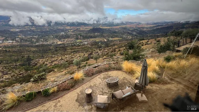 a view of a city with green space