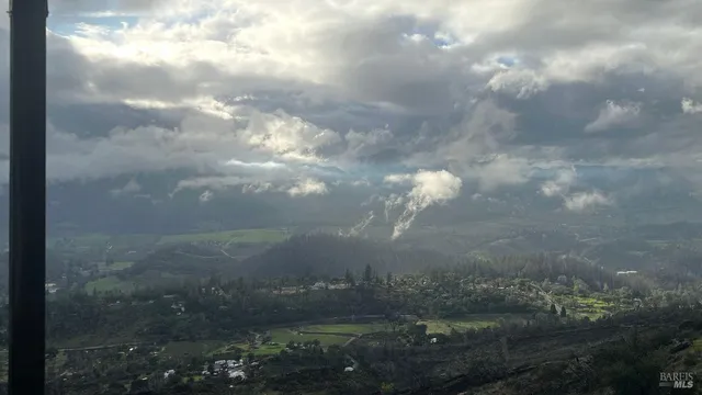 a view of lake and mountain