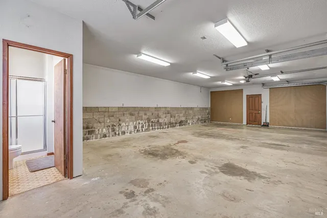 a house that has a tree in front of it