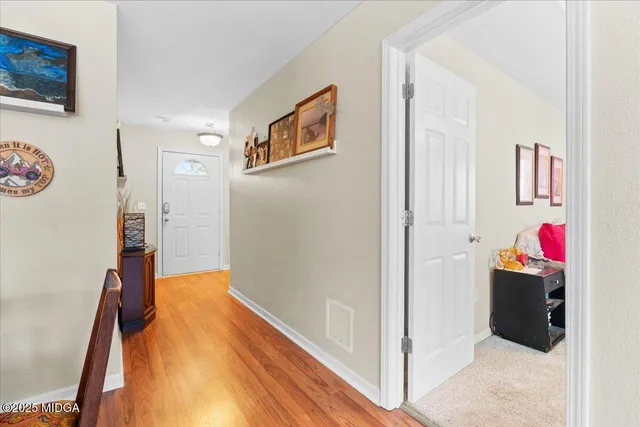 a view of a hallway with interior of the house
