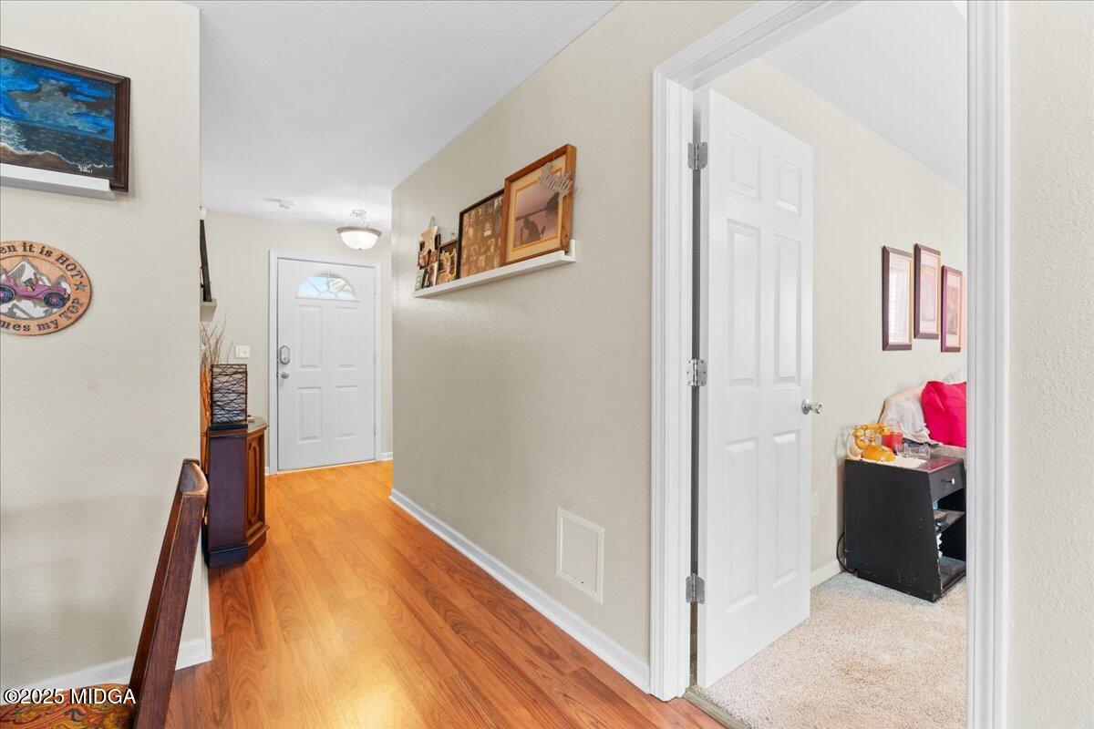 125 Amber Drive Byron, GA 31008 - Photo 16 of 27 a view of a hallway with interior of the house