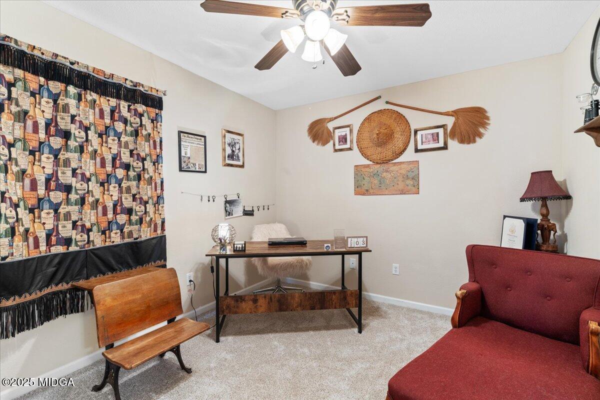 125 Amber Drive Byron, GA 31008 - Photo 24 of 27 a living room with furniture and a window