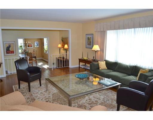 6 Palmer Terrace Riverside, CT 06878 - Photo 15 of 16 a living room with furniture a lamp a rug and a large window