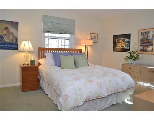 6 Palmer Terrace Riverside, CT 06878 - Photo 8 of 16 a bedroom with a bed and a dresser