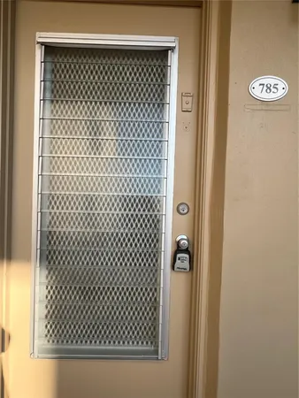 a bathroom with a granite countertop shower
