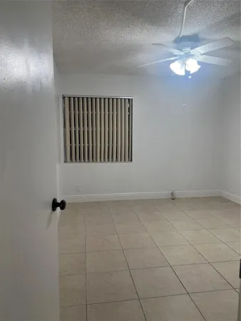 a view of a livingroom with a window