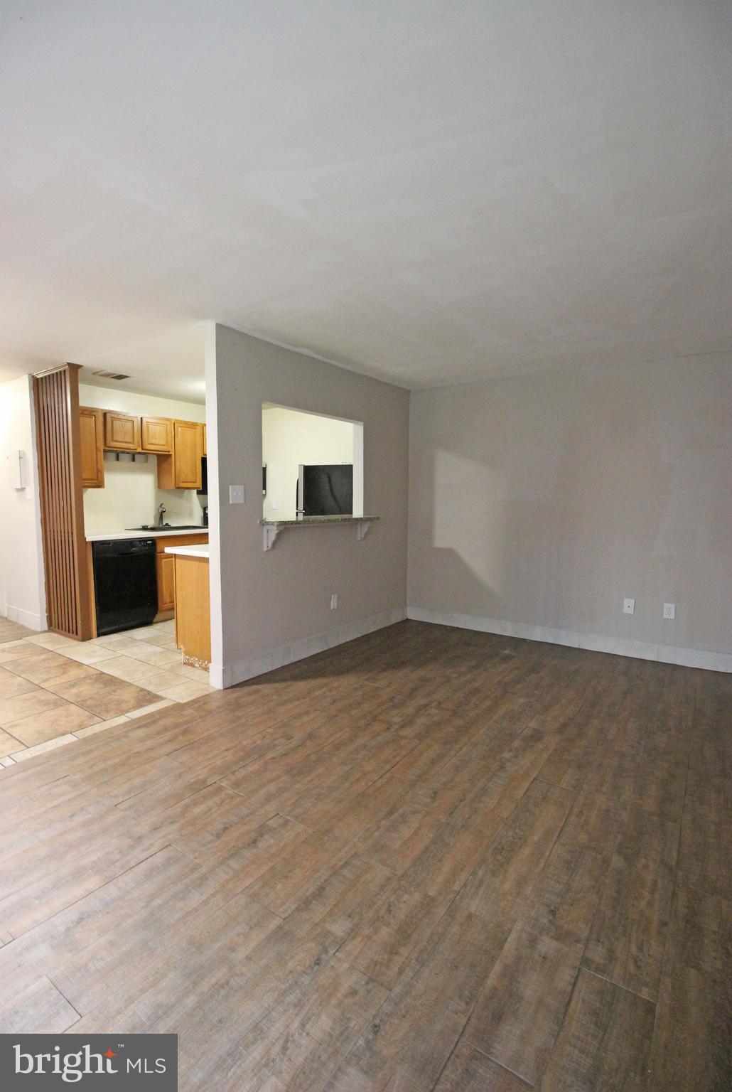 17 Water Street, Unit 30 Gaithersburg, MD 20877 - Photo 3 of 18 a view of an empty room with a window