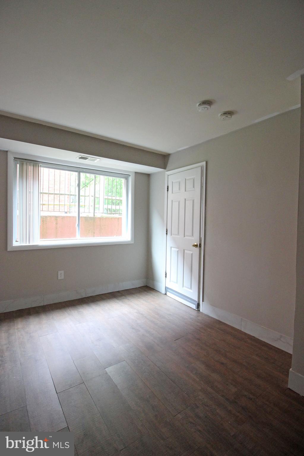 17 Water Street, Unit 30 Gaithersburg, MD 20877 - Photo 8 of 18 a view of an empty room with a window