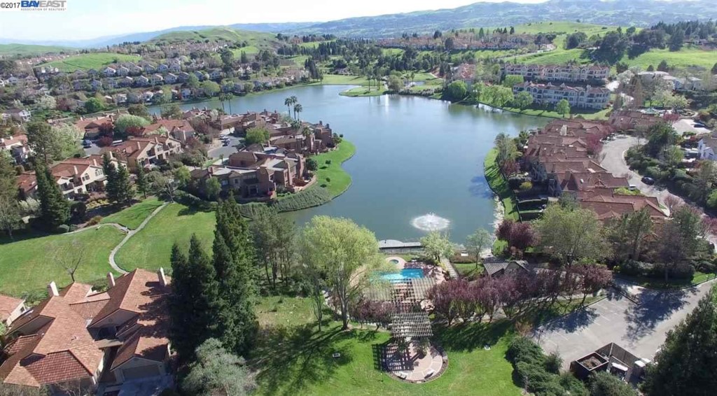 3089 Lakemont Drive San Ramon, CA 94582 - Photo 1 of 1 an aerial view of lake residential house with outdoor space and trees all around