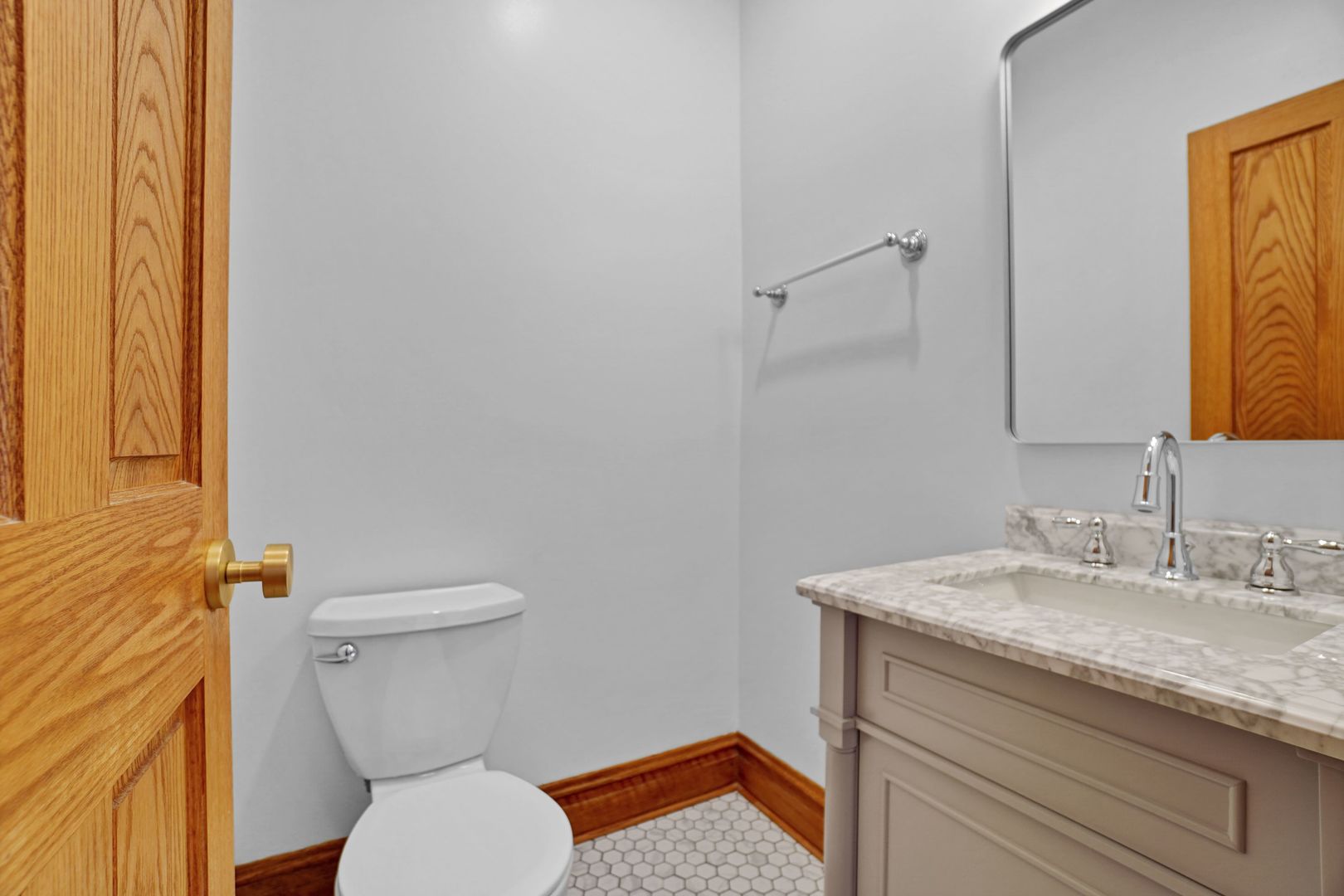 849 West Grace Street, Unit 2 Chicago, IL 60613 - Photo 13 of 19 a bathroom with a granite countertop toilet and a sink