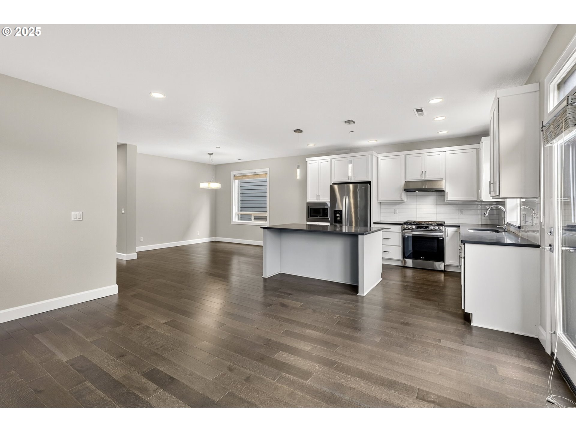 7830 Southeast Boise Court Portland, OR 97206 - Photo 25 of 48 a view of kitchen with wooden floor