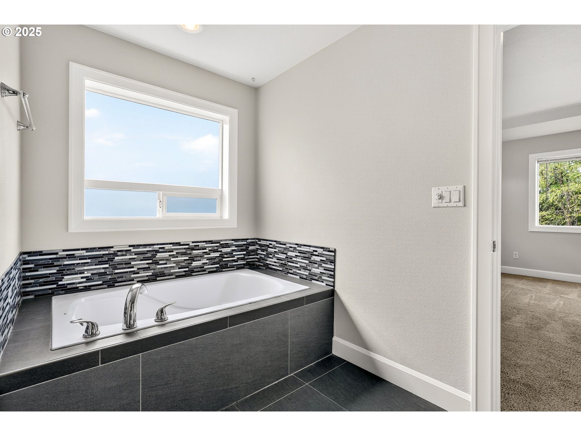 7830 Southeast Boise Court Portland, OR 97206 - Photo 37 of 48 a bathroom with a granite countertop sink a toilet a mirror and window