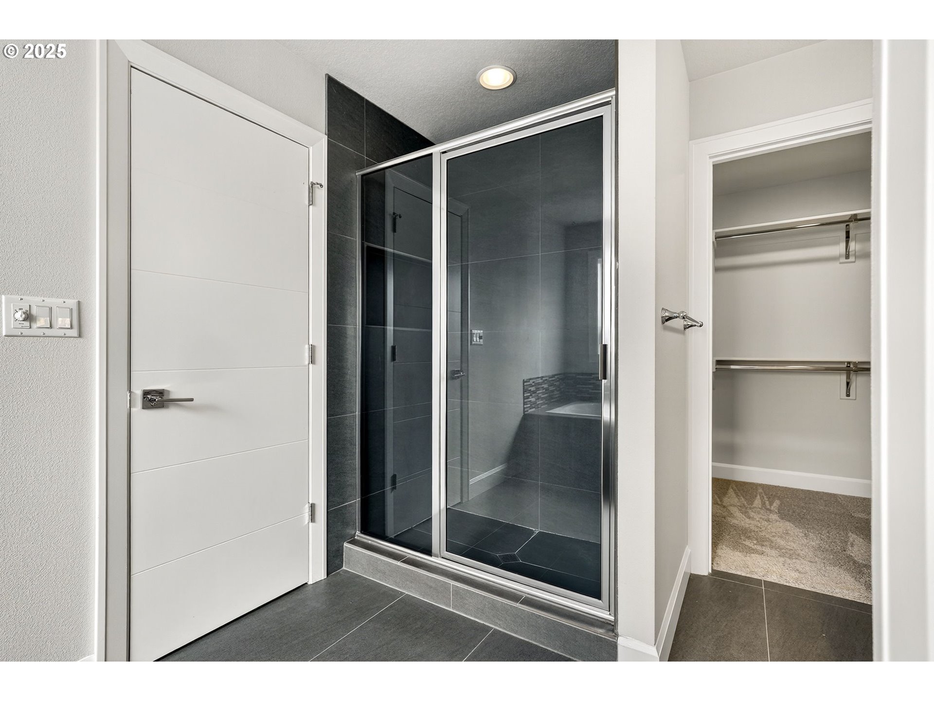 7830 Southeast Boise Court Portland, OR 97206 - Photo 39 of 48 a bathroom with a glass shower door