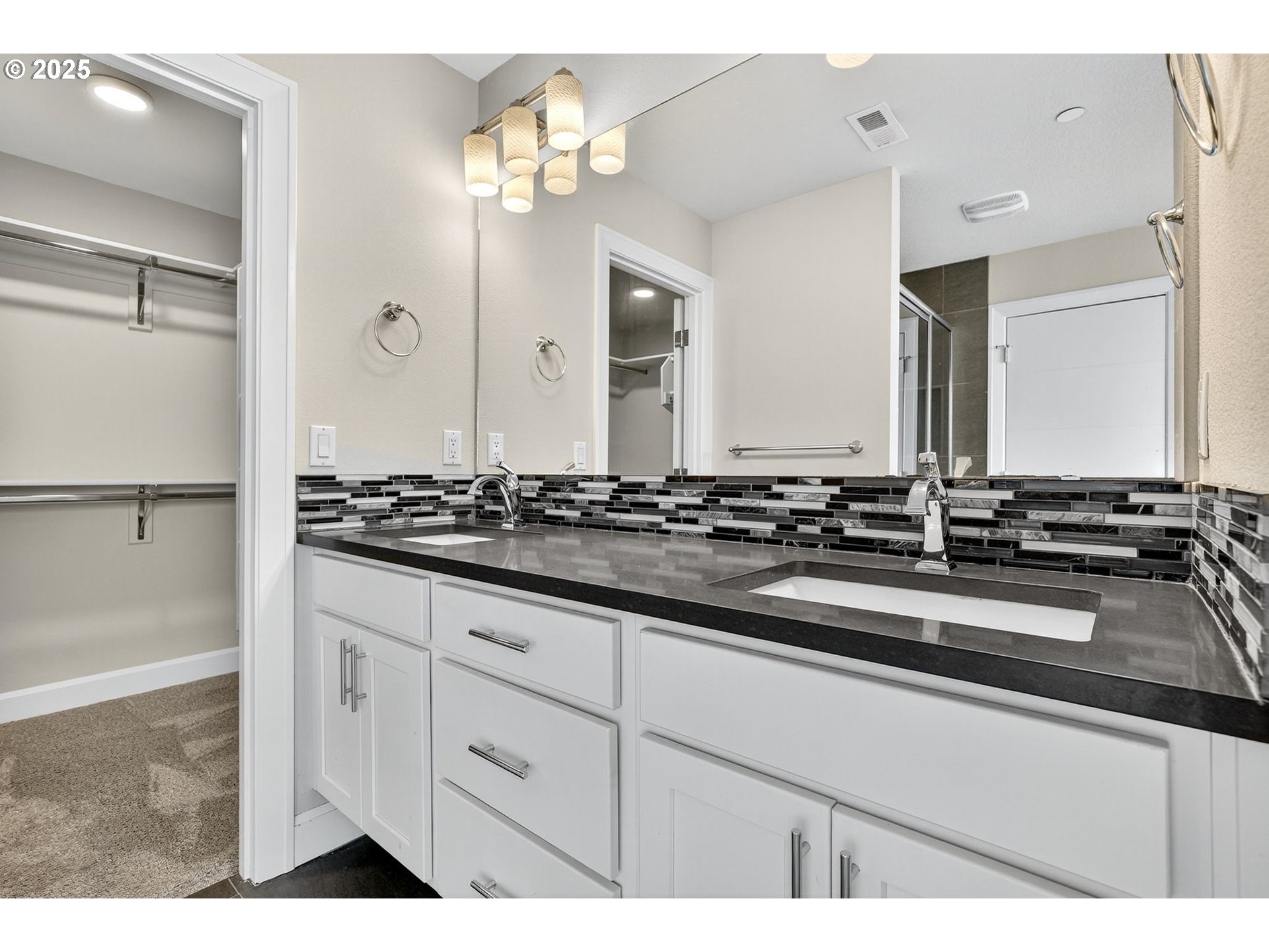7830 Southeast Boise Court Portland, OR 97206 - Photo 40 of 48 a bathroom with a sink and a mirror