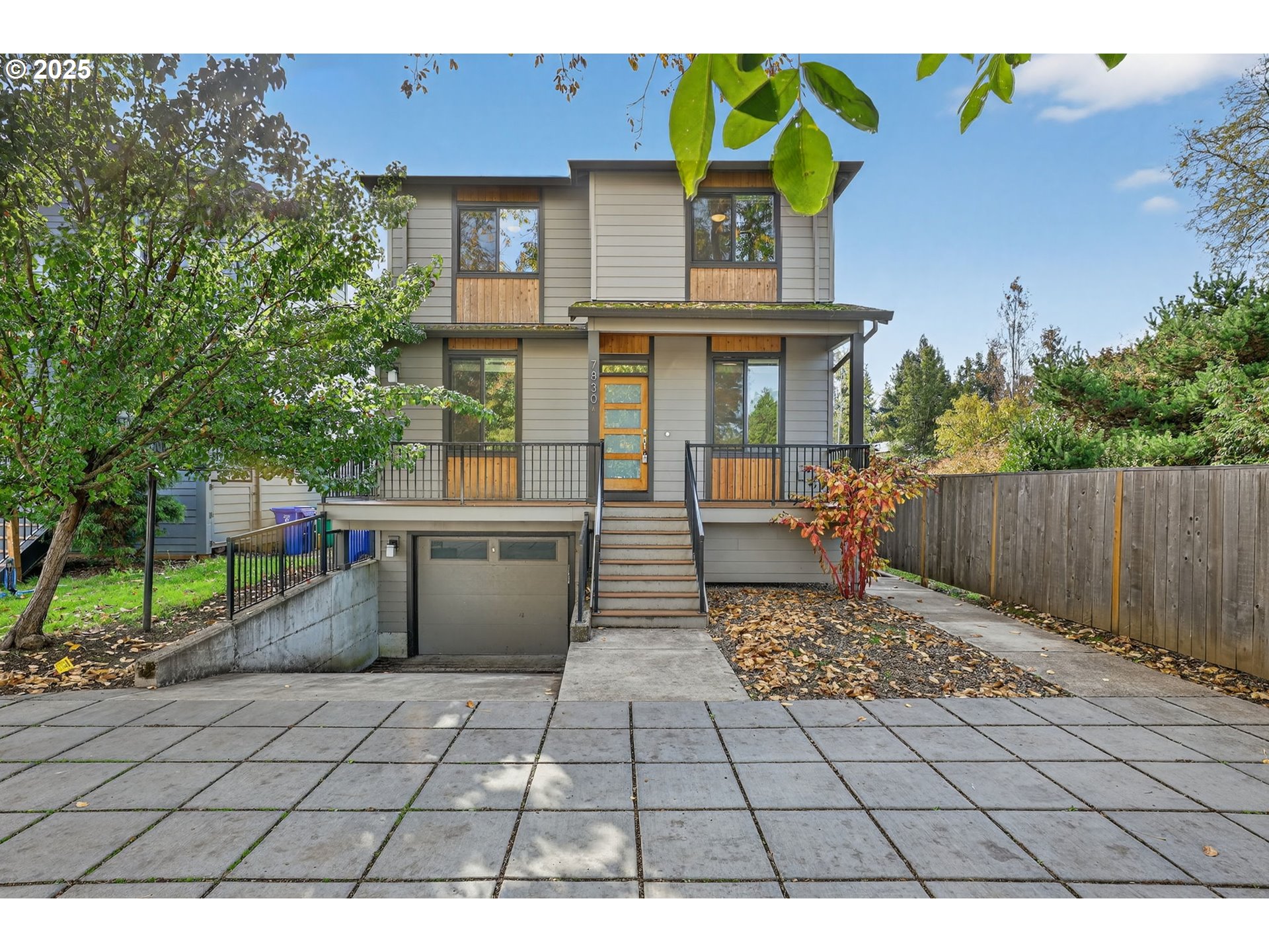 7830 Southeast Boise Court Portland, OR 97206 - Photo 42 of 48 a front view of a house with garden