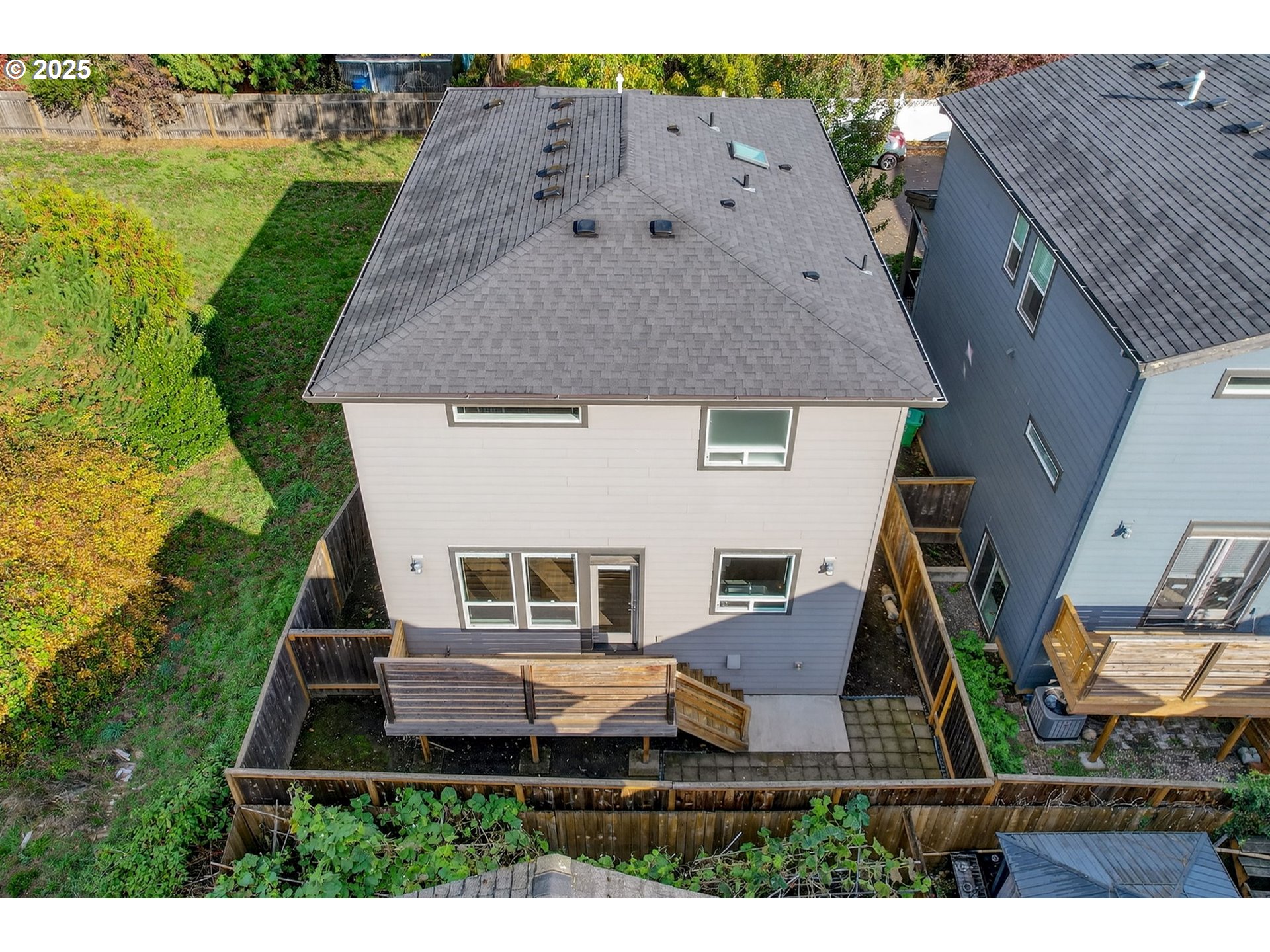 7830 Southeast Boise Court Portland, OR 97206 - Photo 6 of 48 an aerial view of a house with a garden
