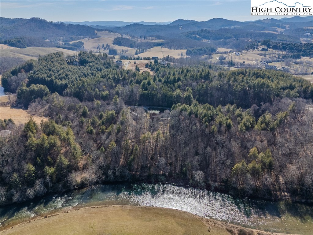 Shawnee Trail Jefferson, NC 28640 - Photo 13 of 24 a view of a house with a mountain