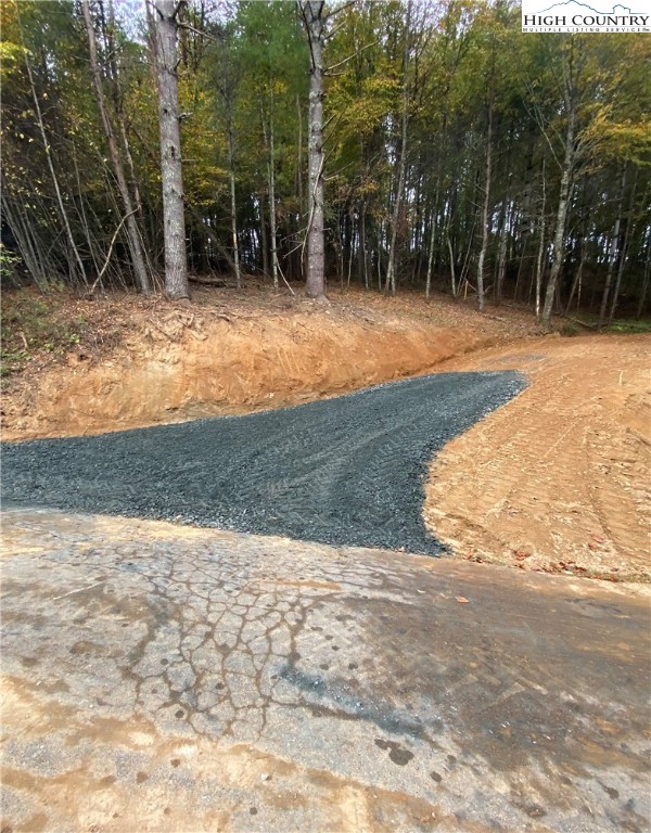 Shawnee Trail Jefferson, NC 28640 - Photo 3 of 24 a view of a yard with large trees