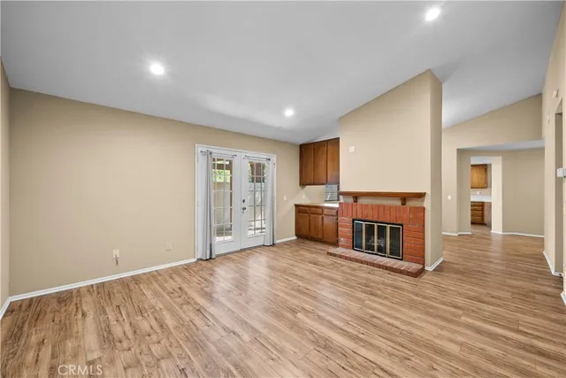 a view of a livingroom with wooden floor