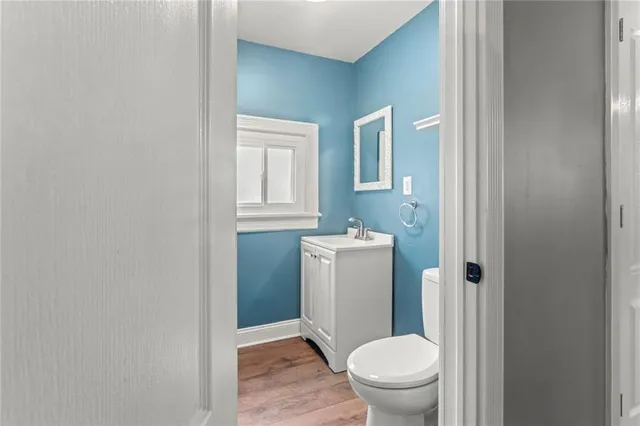 a bathroom with a toilet and a sink