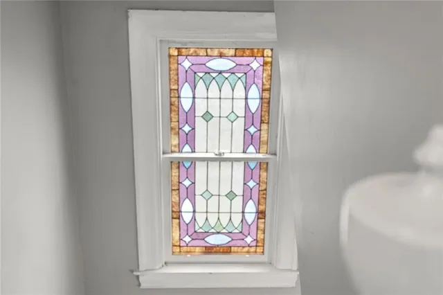 a view of a door and a window