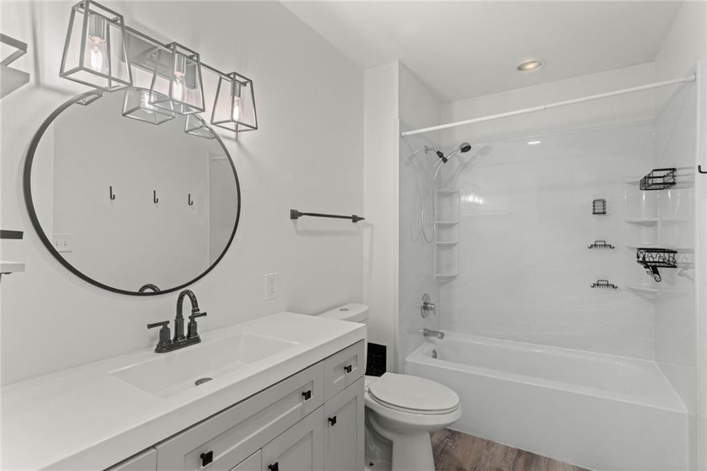 751 Florence Avenue Pittsburgh, PA 15202 - Photo 23 of 45 a bathroom with a sink a toilet and a mirror