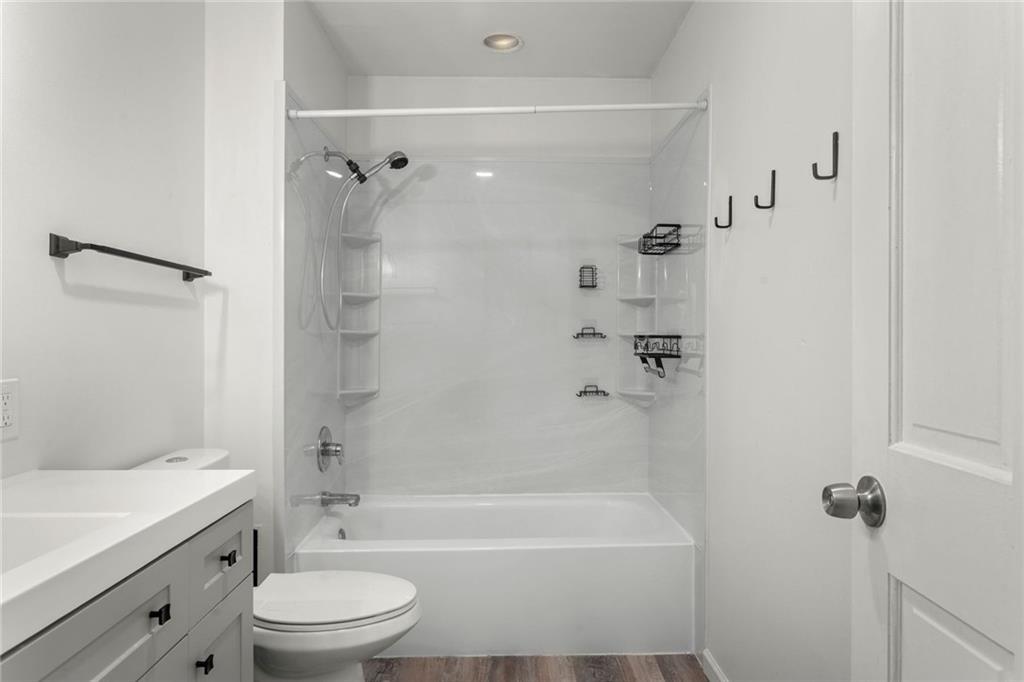 751 Florence Avenue Pittsburgh, PA 15202 - Photo 24 of 45 a bathroom with a bathtub shower sink vanity and toilet