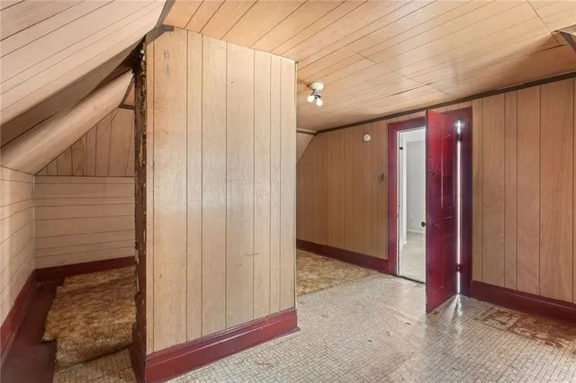 an aerial view of residential building with green space