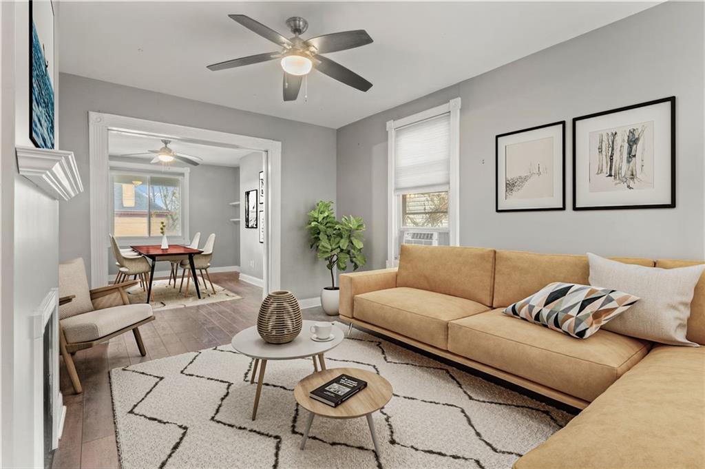 751 Florence Avenue Pittsburgh, PA 15202 - Photo 7 of 45 a living room with furniture potted plant and a window