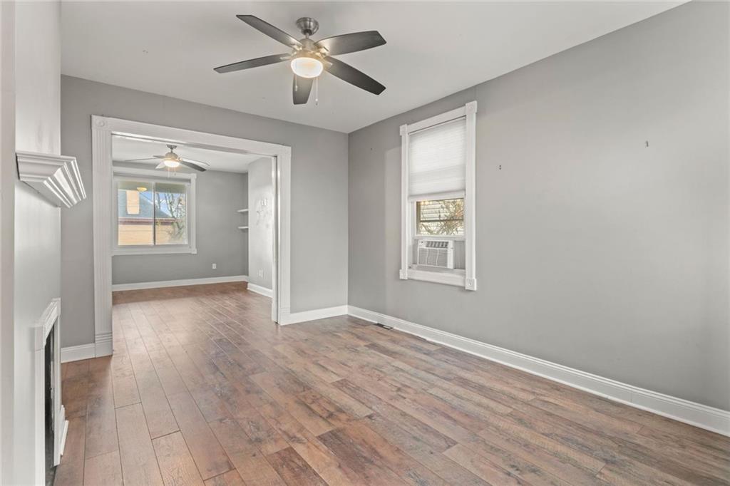 751 Florence Avenue Pittsburgh, PA 15202 - Photo 8 of 45 a view of empty room with wooden floor and fan