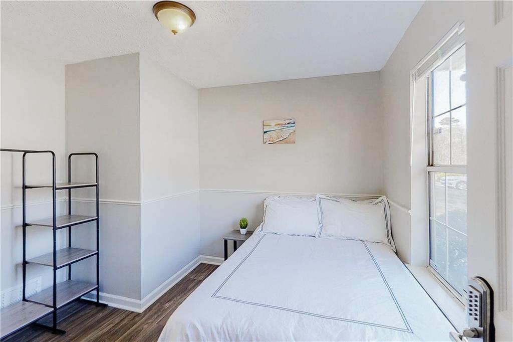 3053 Botany Drive Jonesboro, GA 30236 - Photo 13 of 13 a bedroom with a bed and window