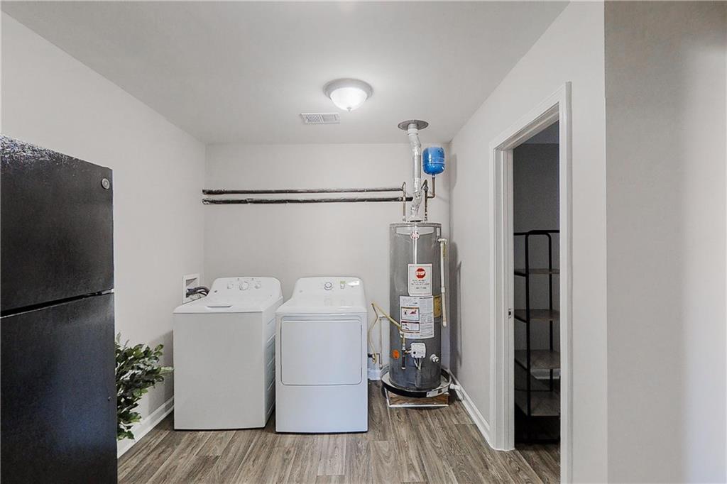 3053 Botany Drive Jonesboro, GA 30236 - Photo 9 of 13 a utility room with dryer and washer