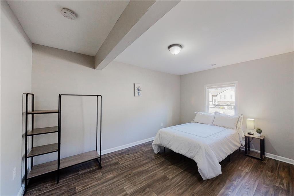 3053 Botany Drive Jonesboro, GA 30236 - Photo 10 of 13 a bedroom with a bed and a window