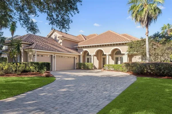 a view of a golf course with a lake
