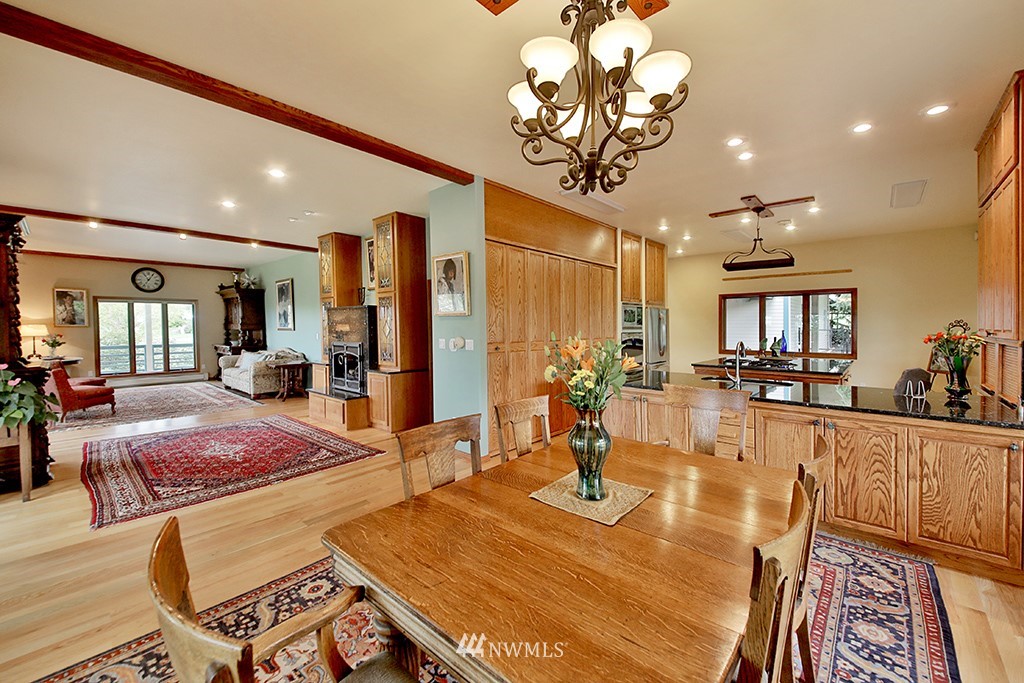 5741 Crow Haven Road Langley, WA 98260 - Photo 11 of 40 a view of a dining room with furniture