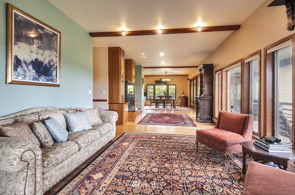 5741 Crow Haven Road Langley, WA 98260 - Photo 14 of 40 a living room with furniture and a rug