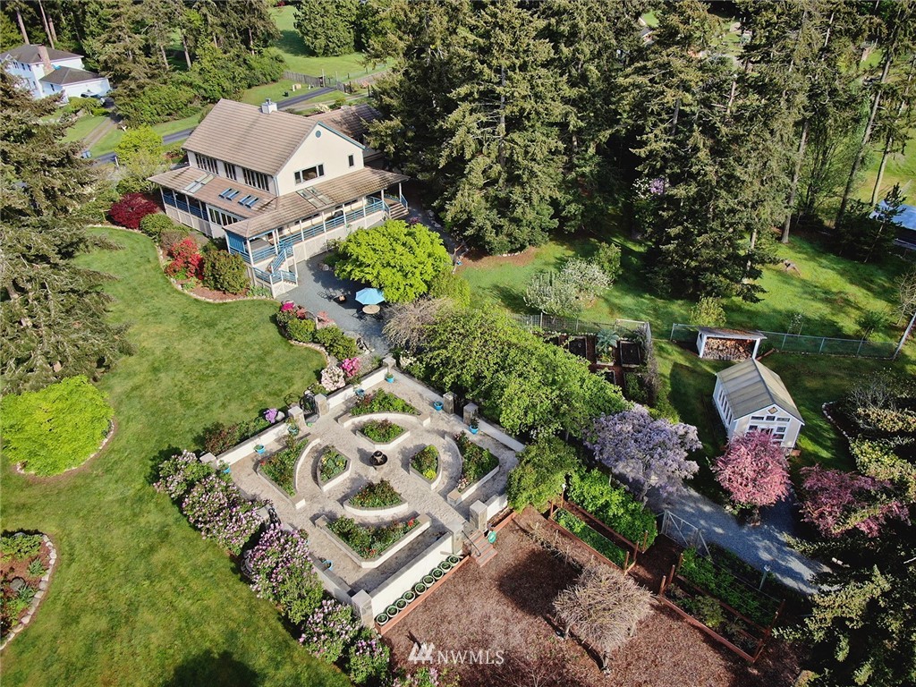 5741 Crow Haven Road Langley, WA 98260 - Photo 3 of 40 a view of a garden with a patio