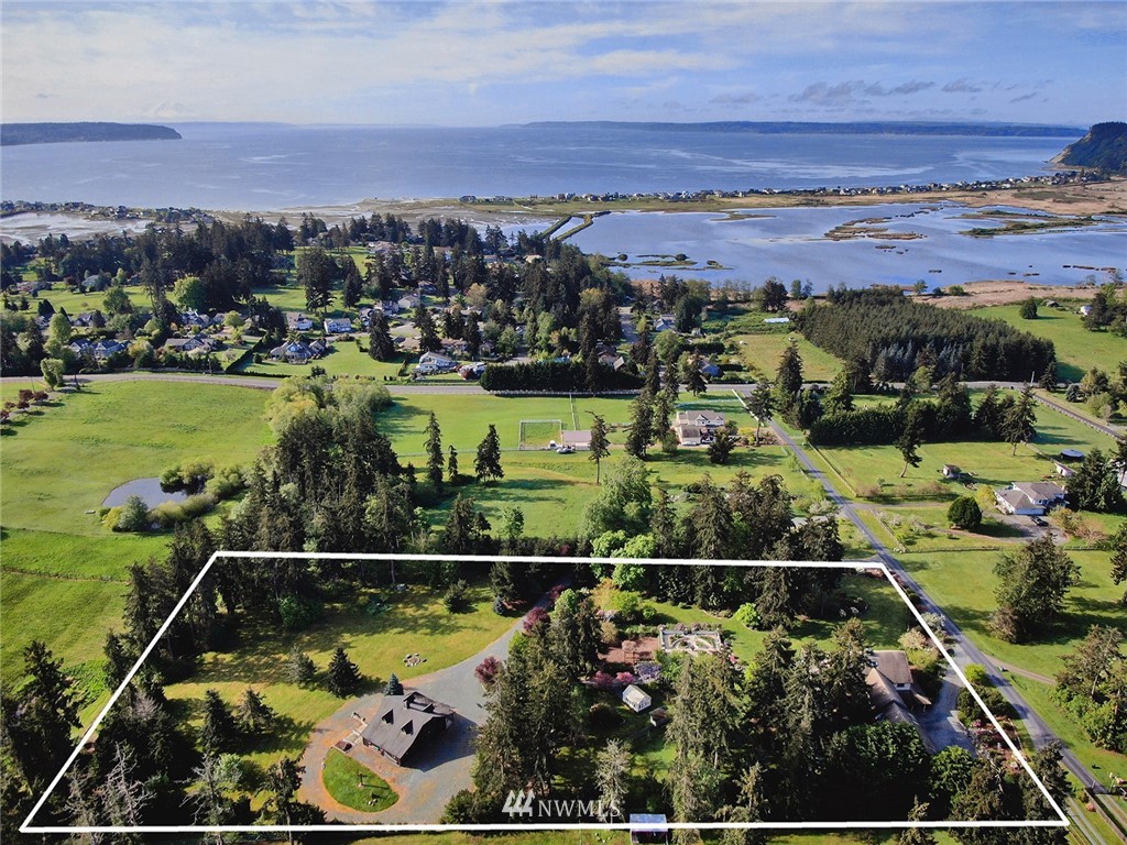 5741 Crow Haven Road Langley, WA 98260 - Photo 28 of 40 a view of a city from a balcony