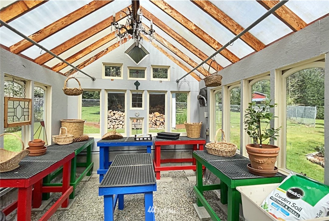 5741 Crow Haven Road Langley, WA 98260 - Photo 35 of 40 a front view of house with outdoor seating