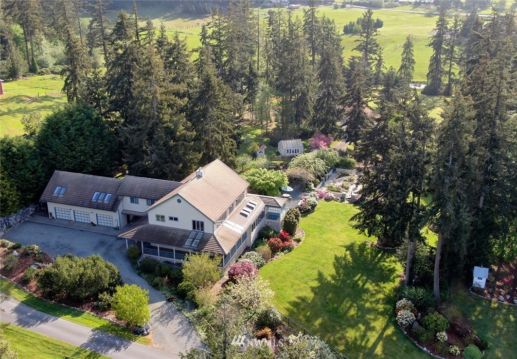5741 Crow Haven Road Langley, WA 98260 - Photo 40 of 40 an aerial view of a house with swimming pool and outdoor space