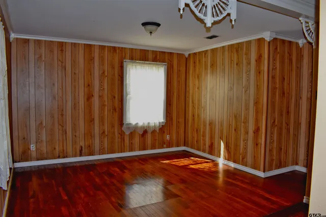 a view of a bathroom from a hallway