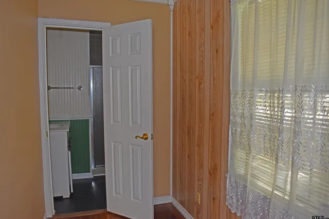 a bath room with a sink and a mirror