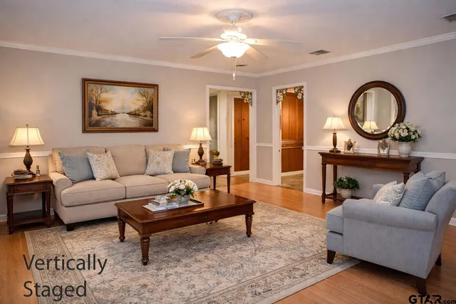 a kitchen with stainless steel appliances granite countertop a sink and a refrigerator