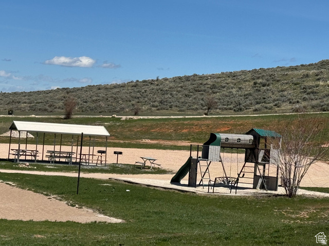 972 Ridgeway Loop, Unit 228 Garden City, UT 84028 - Photo 22 of 26 View of home's community playground and groupl even area