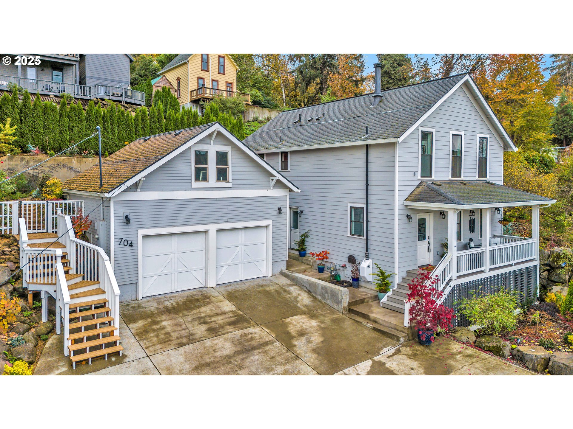 704 3rd Avenue Oregon City, OR 97045 - Photo 3 of 48 a house view with a garden space